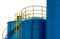 Closeup fuel storage tank in petroleum refinery. Blue big tank of oil storage. Fuel silo. Liquid petroleum tank. Petroleum oil