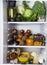 Closeup of full fridge, fresh and colorful vegetables, fruits , dayrt product in the refrigerator, rich nutrition food