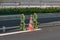 Closeup of funny green road work signs in the streets of Tokyo, Japan.