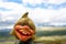Closeup of Funny Norwegian Troll figure laughing outdoors in beautiful landscape scenery