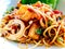 Closeup fusion seafood stir fried spicy spaghetti