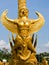 Closeup of garuda golden wax sculpture at Tung Sri Muang park in Ubon Ratchathani province, Thailand