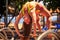 Closeup girl in bikini stands in bridge position on arch ladder