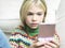 Closeup Of Girl Playing Handheld Video Game