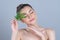 Closeup glamorous woman hold green leaf as cannabis beauty concept.