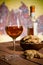 Closeup of a glass of Italian vin santo wine and cantucci biscuits