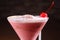 Closeup of a glass of silk stocking cocktail served with a cherry on top