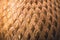 Closeup of gold vase embossed pattern