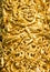 Closeup of golden wax sculpture decoration at Tung Sri Muang park in Ubon Ratchathani province, Thailand