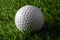 Closeup Golf ball on grass