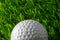 Closeup golf ball on grass