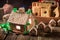 Closeup of gorgeous Christmas gingerbread cottage on rustic table