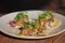 Closeup of Gourmet seafood tacos on a wooden table