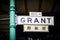 Closeup of a Grant Avenue street sign in the Chinatown district of San Francisco, California