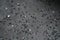 Closeup of graphite gray terrazzo with black marble