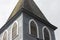 Closeup of Gray Wooden Church Steeple