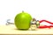 Closeup of green apple and a stethoscope healthy food and concept for diet, Healthcare, Nutrition or medical insurance. Fruit,