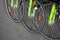 Closeup of green bicycles arranged in a raw