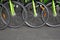 Closeup of green bicycles arranged in a raw