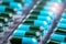 Closeup green-blue antibiotic capsule pills in blister pack. Antimicrobial drug resistance. Pharmaceutical industry. Global health