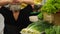 Closeup of greens and vegetables on the counter, on bazaar. green onions, celery, parsley, dill. 4k.