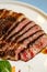 Closeup on grilled and sliced ribeye beef steak