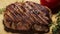 Closeup of grilled steak on the wooden surface