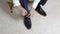 Closeup of a groom tying his shoes. Getting ready for a wedding ceremony