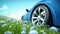 Closeup from the ground of the left side of a Blue Sport Car stop inside a Green Field with lots of white flowers like Dandelion