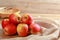 Closeup group of fresh Jazz Apples on wooden board background, Fruits concept