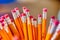 A closeup of a group of pencils.