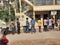 Closeup of group of peoples standing in a queue to take Covid 19 Vaccination free at the Primary Health Centre Rajagopala Nagar