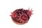 Closeup of group Roselle fruits isolated on wooden cup white ba