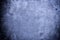 Closeup grunge deep blue metal plate as background texture