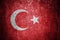 Closeup of grunge Turkish flag. Dirty Turkey flag on a metal surface