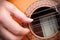 Closeup of a guitarist hand with guitar