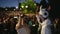 Closeup guy paint fan face scream furiously, people backdrop crowd win football.