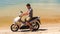 Closeup Guy Sits on Motorbike Starts to Drive along Beach