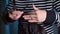 Closeup of hairdresser hands with comb and scissors.