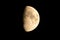 Closeup of the half moon, black sky