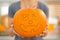 Closeup. Halloween pumpkin Jack-O-Lantern in womans hands