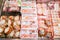 Closeup hams and processed meat in packs for sale in Japan supermarket`s freezer