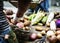 Closeup of hand arrange potatoes on wooden table