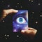 closeup of hand holding a mysterious card with eye on it looking at you. tarot and astrology concept art.