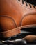 Closeup on handcrafted brown leather boots details