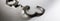 Closeup of handcuffs on obscure stainless steel background for prison