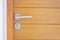 Closeup handle doorknob and keyhole of wooden door