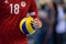 Closeup of hands and ball during the Hellenic Volleyball League
