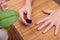 Closeup of hands with nail enamel