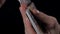 Closeup of hands shuffling playing cards, dealer mix poker cards in casino close up macro